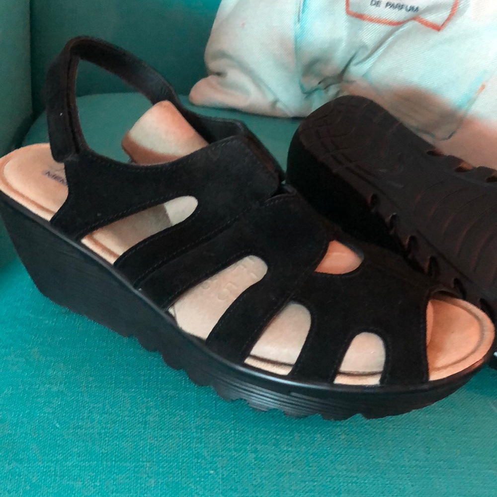 Size 11. Skechers memory foam wedges black.